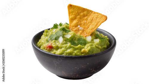 Foto Fresh guacamole in dark bowl with tortilla chip and cilantro