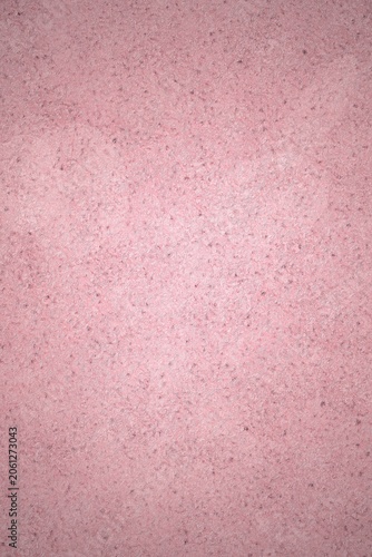 Pink textured abstract background with subtle speckles