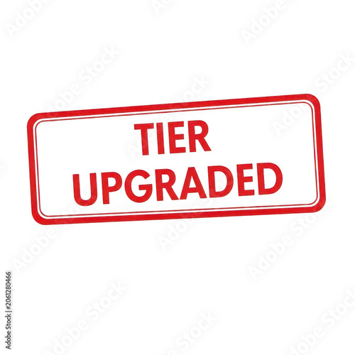 Red rubber stamp with text tier upgraded