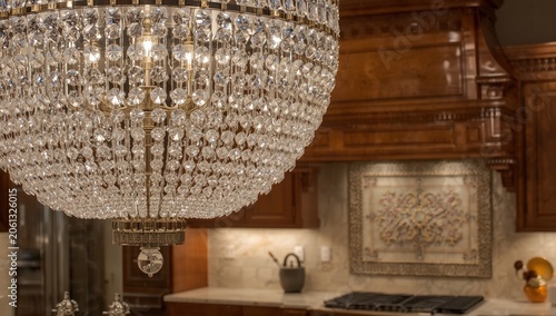 Close-up of a luxurious crystal chandelier in a stylish interior.