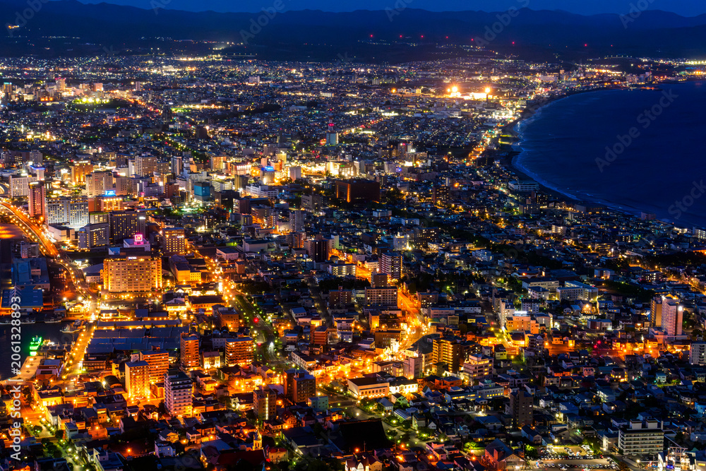 Fototapeta premium Night view of Hakodate from Mount Hakodate, one of Japan's three famous night views, Hokkaido, Japan. Spectacular night view of Hakodate city seen from Mount Hakodate in Hokkaido, Japan.