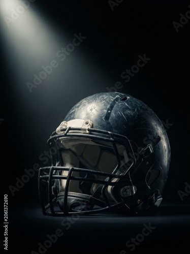 American Football Helmet Under Spotlight