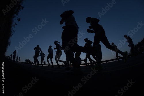 Ultra Marathon Runners Closeup Silhouettes Running Motion Blurs Dawn