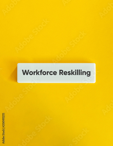 Workforce reskilling text on a vibrant yellow background