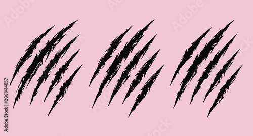 Obraz na plátne Black animal claw marks scratch sets isolated on pink background for wild beast