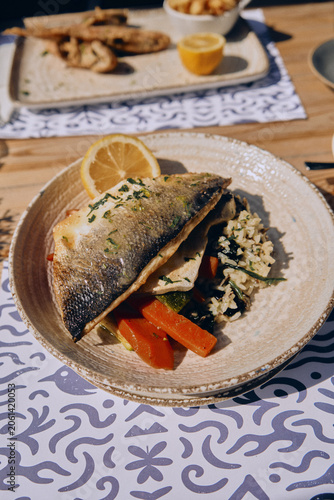 Grilled Fish Fillet with Vegetables Served at Restaurant