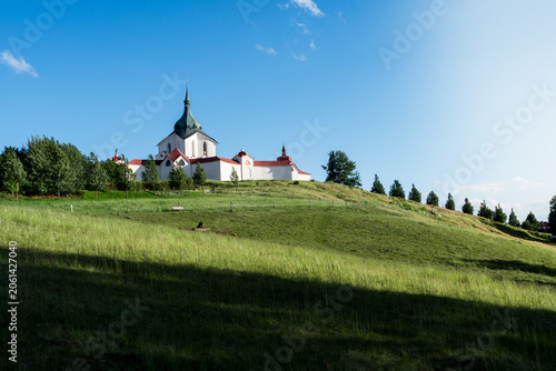 Pilgrimage Church of Saint John of Nepomuk on Zelená Hora, Žďár nad Sázavou with Fresh Green Meadow in Summer