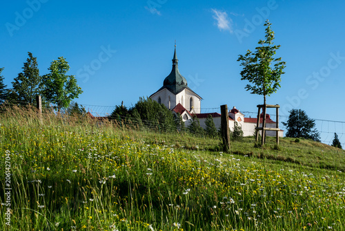 Pilgrimage Church of Saint John of Nepomuk on Zelená Hora, Žďár nad Sázavou with Fresh Green Meadow in Summer