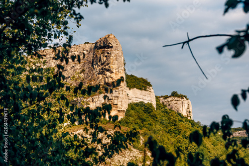 Landscape of Crimea mountains, panorama peak range in haze summer