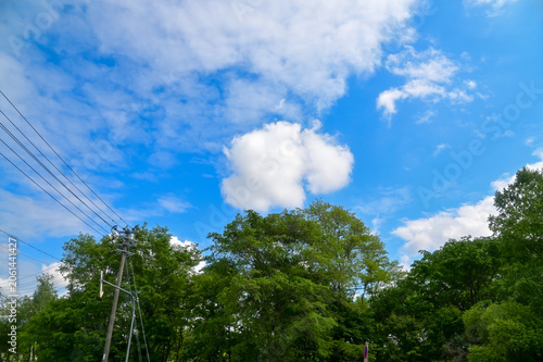 The scenery of the countryside during the roadtrip with stunning scenery of Sapporo, Hokkaido, Japan. Stunning cloudscape with beautiful landscape. Nature and Travel scene.
