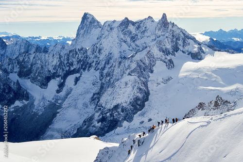 Hikers Climb Across Snow-Covered Alpine Mountains, Viewed from Aiguille du Midi, Chamonix