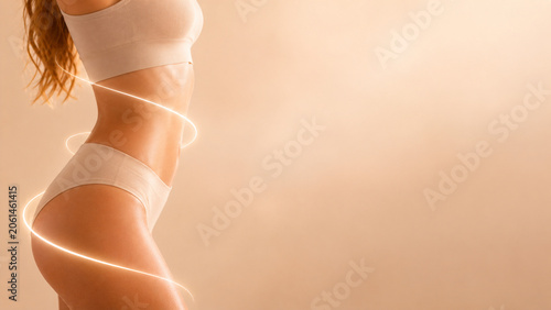 Tapety artystyczne Body sculpting and weight loss concept with glowing light on woman