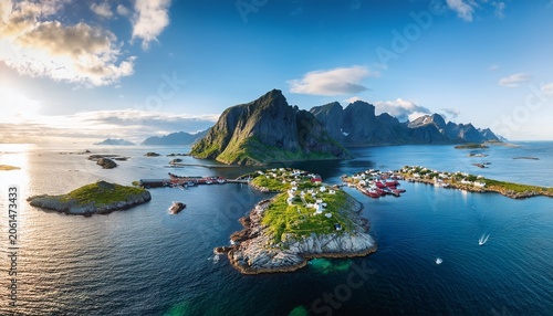 aerial drone view of henningsvaer village in lofoten islands norway scenic summer landscape with mountains islands and ocean scenic view travel and arctic nature in scandinavia