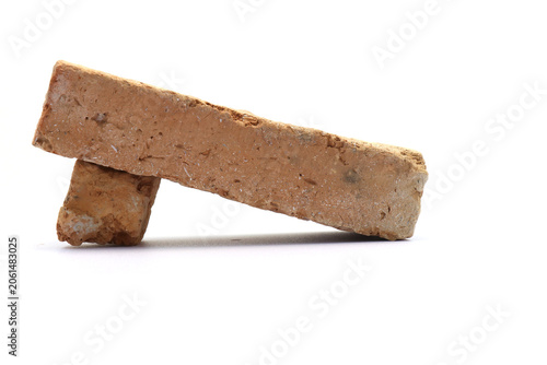 Quadro su tela Traditional bricks on a white background for wall construction.