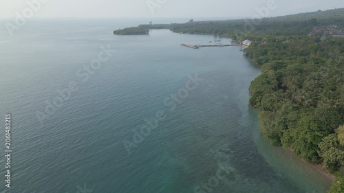 Coastal Aerial Reveal Of Sebesi Village Jetty And Reef Lampung