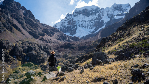 Konstfotografi Hiker contemplating the majestic Allincapac snow-capped mountain in Macusani, Peru