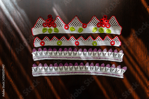 Fotografie Hand-crocheted lace on the background