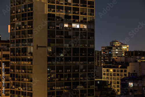 Urban Office Buildings at Dusk with Air Conditioning Units