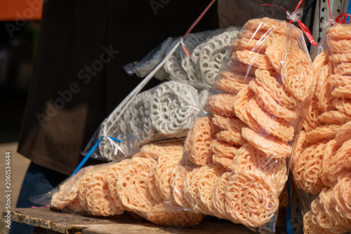 Fotografie Kerupuk Mawar (Rose Crackers) is a traditional Indonesian snack made from starch and flavoring