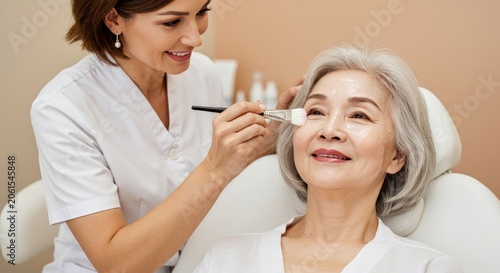 Woman receiving facial treatment.