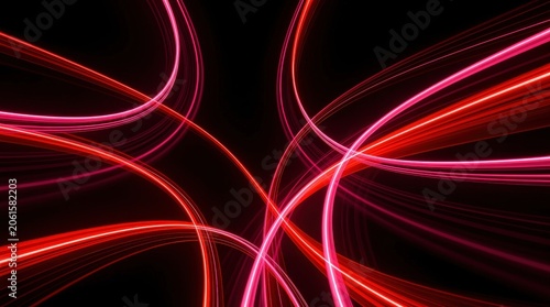 Bright red and pink light trails create dynamic, curved patterns against a black background, forming an abstract, futuristic energy flow.