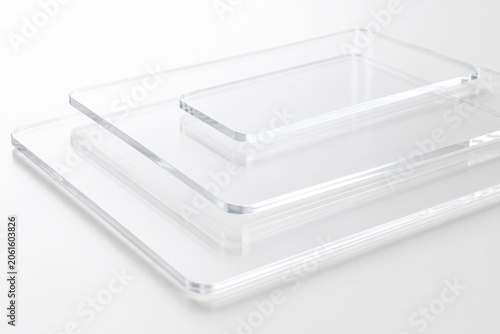 Clear Acrylic Plates Stacked on a Light Background for Minimalist Look