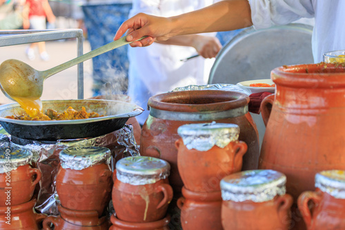 The Tanjia Marrakshia beef with clay jars, food stall, moroccan street food