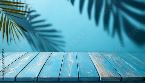 empty wooden blue table over wall with palm tree shadow background summer picnic mock up for design and product display