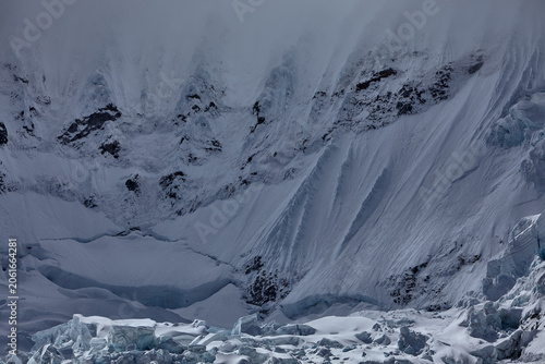 the south face of Chacraraju, captured here in a brooding, steel-blue study of glacial architecture at its most merciless and magnificent, belongs unambiguously, irrevocably to the second category. 