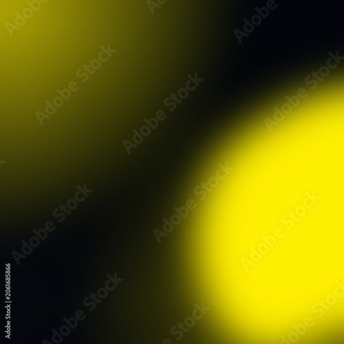 Bright Yellow Light Glow in Dark Abstract Background with Soft Focus