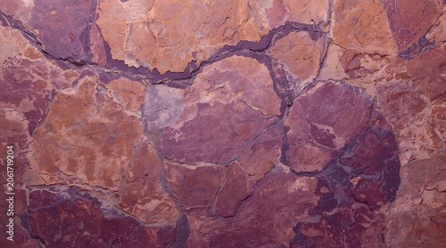 Detailed Close-Up of a Weathered Stone Wall Texture.