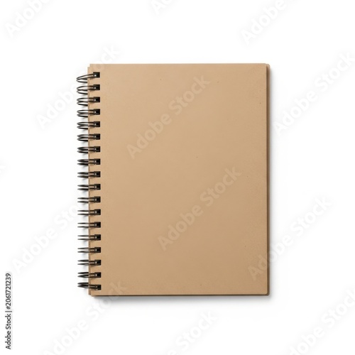 A neatly coiled spiral-bound brown notebook with blank pages.