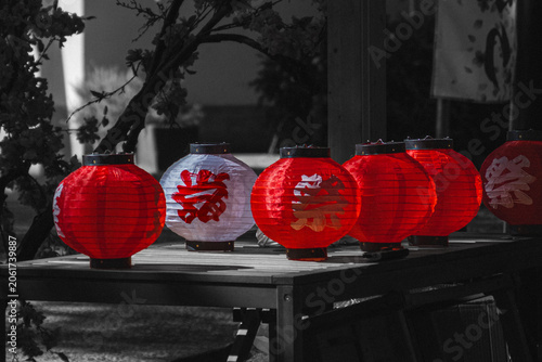 Japanese Festival Lanterns with Red and White Paper Lamps Glowing at Night