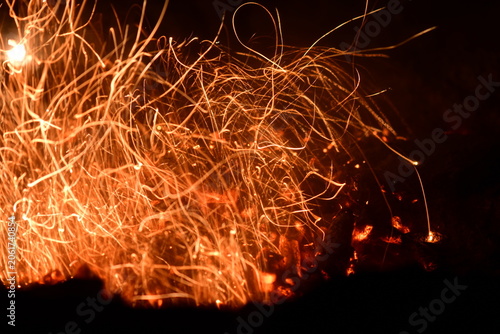 Fotografie sparks and fire on black background