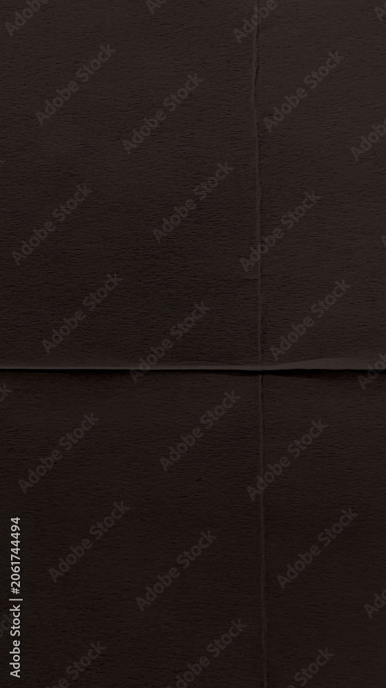 Fototapeta premium Dark brown textured paper background, perfect for mobile wallpaper.