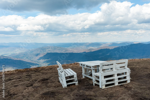 The rest place with the view to Carpathian Mountains on the top of Polonyna Runa, Zakarpattia, Ukraine