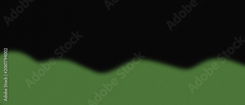 Wavy green hills silhouette against a dark black sky background.
