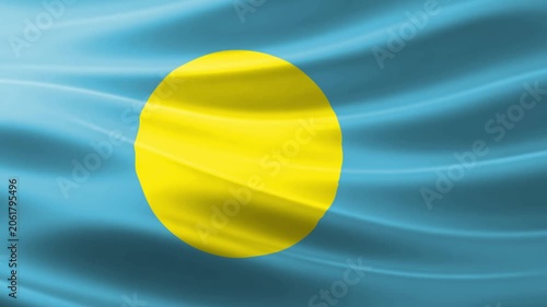 Bright yellow tennis ball resting on vibrant blue fabric texture background minimalistic composition