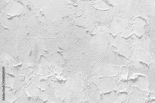 Abstract white impasto paint texture on canvas.