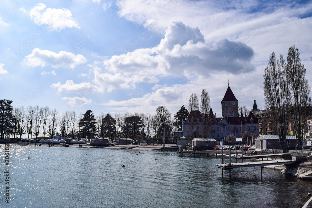 Fototapeta premium Ouchy port lausanne with chateau d'ouchy on lake geneva
