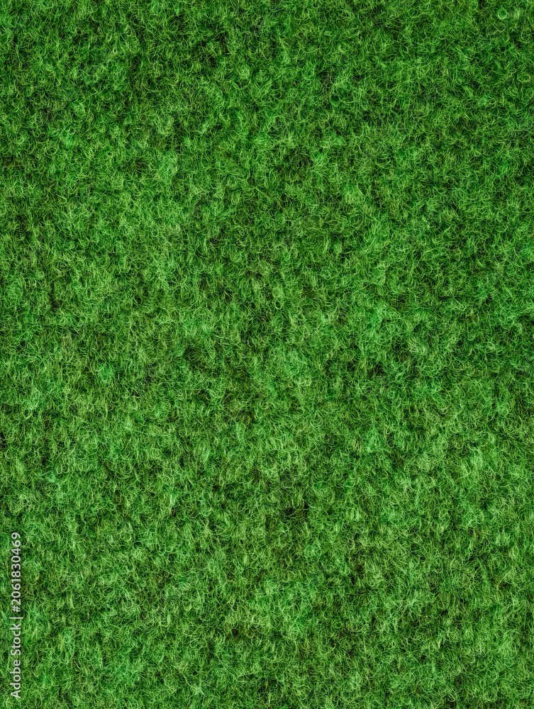 Fototapeta premium Close-up textured green grass surface filling frame