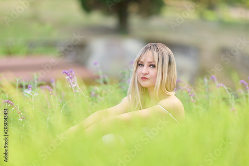 Woman Framed By Tall Grass Outdoors