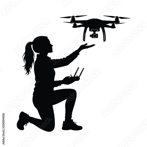 Woman guiding drone in silhouette