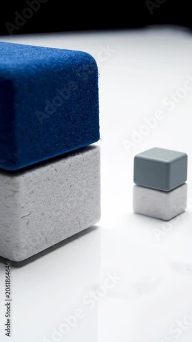 Blue and gray building blocks with small pieces on tray