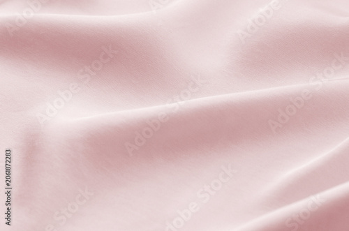 Pink smooth textile as abstract background