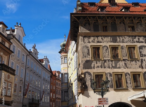 Historic House at the Minute on Old Town Square in Prague, Czech Republic. The Renaissance facade decorated with sgraffito artwork, rich architectural heritage Prague's historic center.