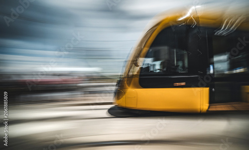 Modern Tram Rushes Through Budapest Streets With Dynamic Motion Blur Capturing City Energy