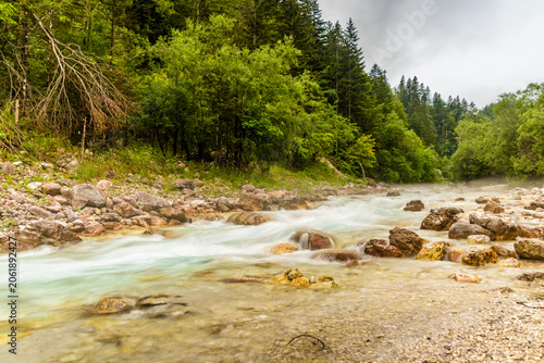 Long exposure of a small stream flowing over rocks,