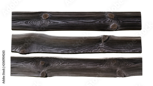 Valokuva Three dark weathered wooden planks with prominent knots, isolated on transparent