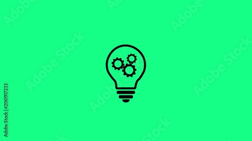 Light bulb and rotating gears icon animation isolated on green background. Idea, energy, team work, thinking and Inspiration concept for representing innovation and creative mechanical engineering